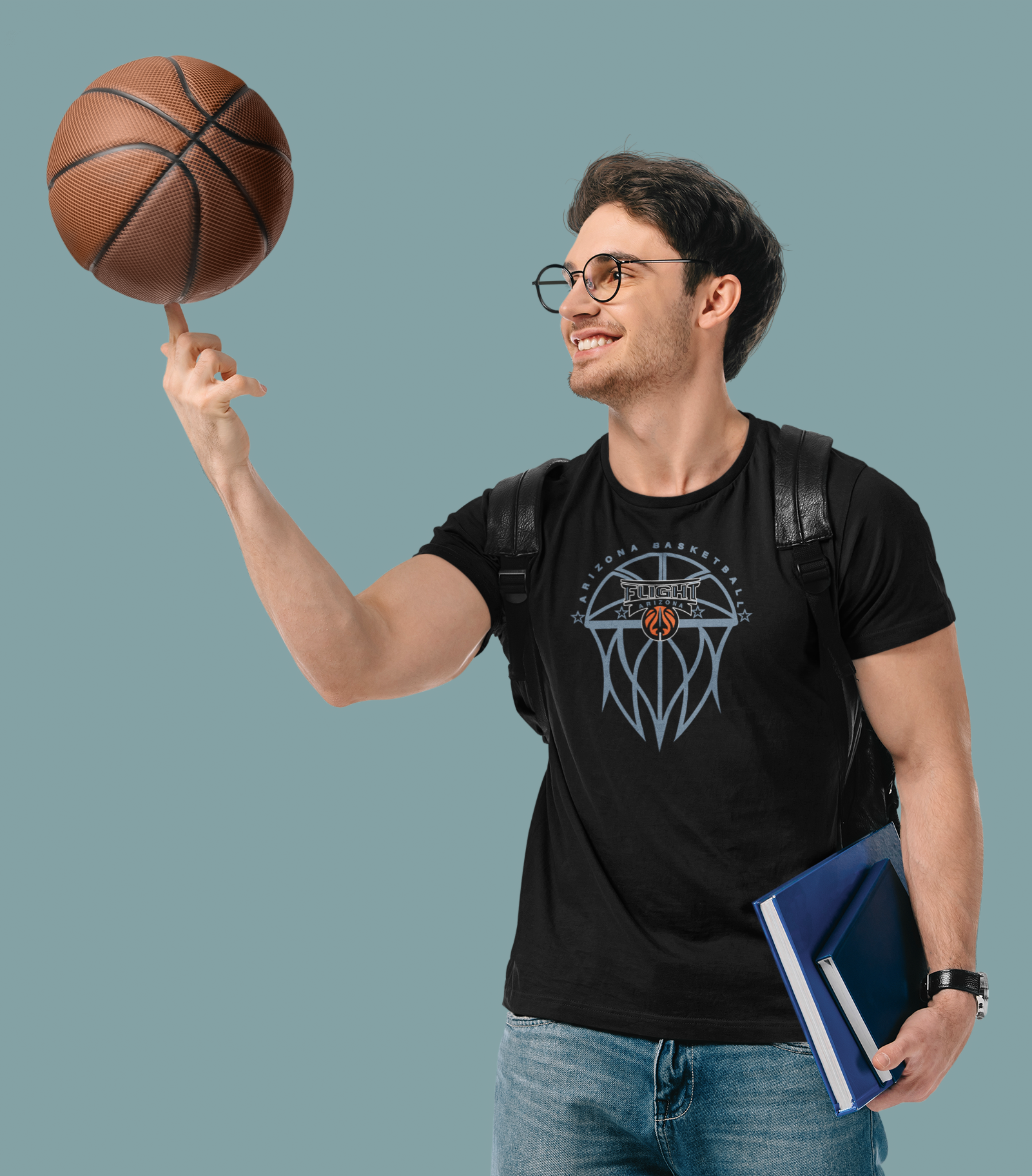 Student athlete with backpack and basketball